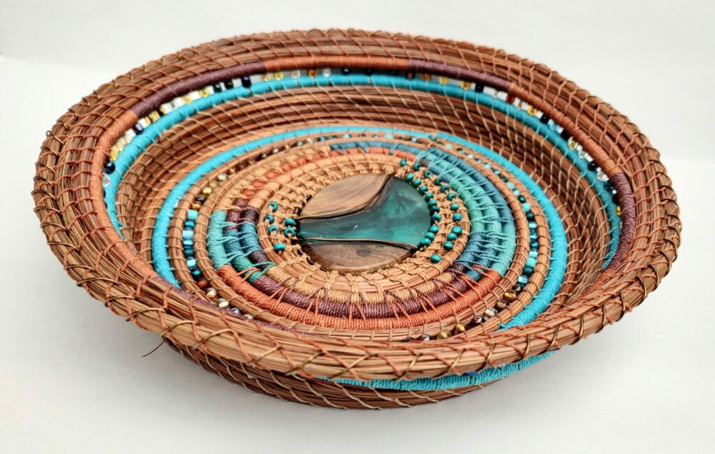 Four pine needle artists collaborated to create this beautiful basket 